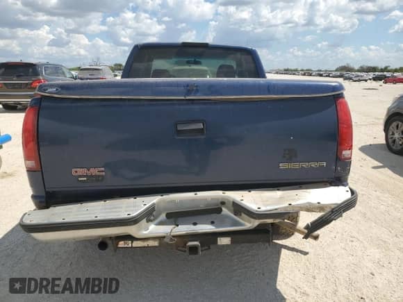 1998 GMC Sierra 1500 z VIN 1GTEC19W5WE518398, wystawiony jako Copart lot #73168034 z przebiegiem 356 084 mil mil oraz Szkoda całkowita • Salvage title. Historia ofert i sprzedaży dostępna na DreamBid. Obrazek 6.