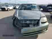 2003 Hyundai Accent GL z VIN KMHCG35CX3U242820, wystawiony jako Copart lot #45971325 z przebiegiem 132 192 mil mil oraz Szkoda całkowita • Salvage title. Historia ofert i sprzedaży dostępna na DreamBid. Obrazek 5.