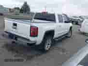 2018 GMC Sierra 1500 SLT z VIN 3GTU2NEC2JG474475, wystawiony jako IAAI lot #43194997 z przebiegiem 136 451 mil mil oraz . Historia ofert i sprzedaży dostępna na DreamBid. Obrazek 4.