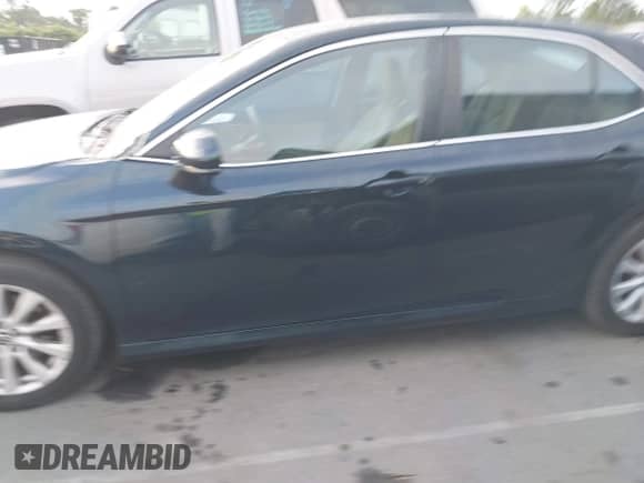 2018 Toyota Camry SE with VIN 4T1B11HK2JU647720, listed as a IAAI auction lot 42849487 with 159,188 mi miles and . Bid and sale history available at DreamBid. Image 14.