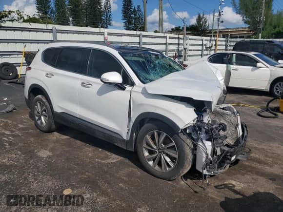 2020 Hyundai Santa Fe Limited с VIN 5NMS53AD3LH169897, выставлен на аукционе Copart как лот 81095425 с пробегом Не указан миль и На запчасти • Non repairable. История ставок и продаж доступна на DreamBid. Изображение 4.