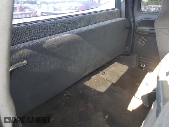 2000 Dodge 1500 z VIN 1B7HF13Z9YJ150874, wystawiony jako Copart lot #62714255 z przebiegiem 173 515 mil mil oraz Szkoda całkowita • Salvage title. Historia ofert i sprzedaży dostępna na DreamBid. Obrazek 10.