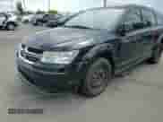 2015 Dodge Journey American Value with VIN 3C4PDCAB2FT644972, listed as a Copart auction lot 64377425 with 131,776 mi miles and Salvage title. Bid and sale history available at DreamBid. Image 14.