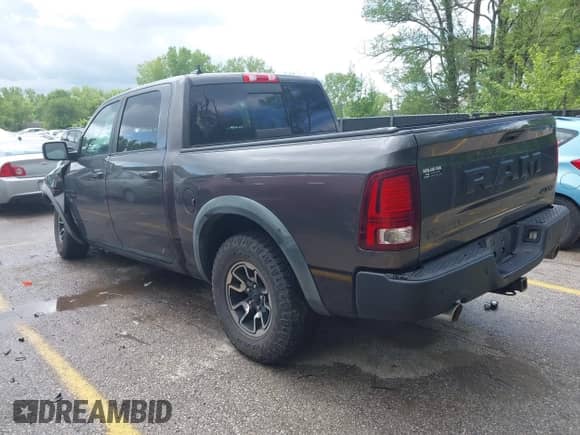 2015 Ram 1500 Rebel with VIN 1C6RR7YTXFS785507, listed as a IAAI auction lot 42172925 with 100,201 mi miles and . Bid and sale history available at DreamBid. Image 3.