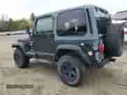 2001 Jeep Wrangler Sport z VIN 1J4FA49SX1P347129, wystawiony jako Copart lot #90684705 z przebiegiem 139 975 mil mil oraz Czysty tytuł • Clean title. Historia ofert i sprzedaży dostępna na DreamBid. Obrazek 2.