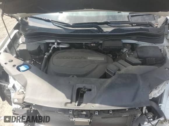 2020 Honda Pilot Touring 8-Passenger z VIN 5FNYF6H94LB051790, wystawiony jako Copart lot #67845865 z przebiegiem 63 874 mil mil oraz Szkoda całkowita • Salvage title. Historia ofert i sprzedaży dostępna na DreamBid. Obrazek 12.