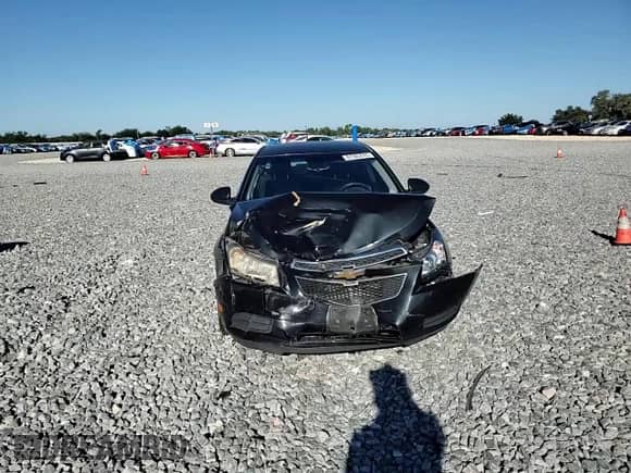 2014 Chevrolet Cruze 1LT z VIN 1G1PC5SB1E7340783, wystawiony jako Copart lot #81585645 z przebiegiem 146 731 mil mil oraz Szkoda całkowita • Salvage title. Historia ofert i sprzedaży dostępna na DreamBid. Obrazek 13.