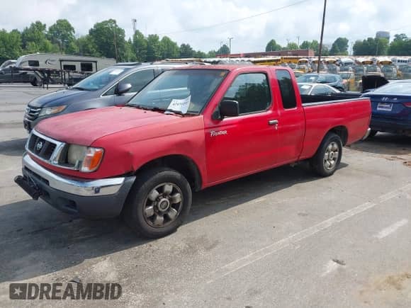 1999 Nissan Frontier XE with VIN 1N6DD26S5XC342429, listed as a IAAI auction lot 42431193 with 400,533 mi miles and . Bid and sale history available at DreamBid. Image 2.