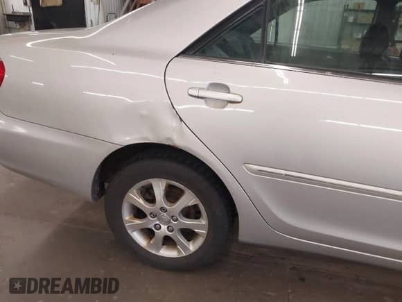 2005 Toyota Camry LE with VIN 4T1BE30KX5U015503, listed as a IAAI auction lot 43089512 with 204,687 mi miles and . Bid and sale history available at DreamBid. Image 6.