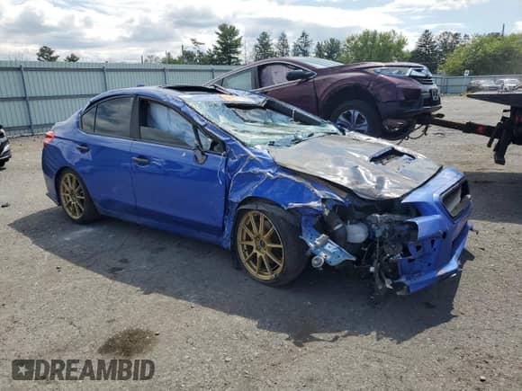 2017 Subaru WRX Premium with VIN JF1VA1E62H8820203, listed as a Copart auction lot 71087045 with Not provided miles and Salvage title. Bid and sale history available at DreamBid. Image 4.