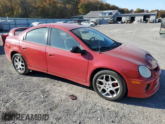 2004 Dodge Neon SRT-4 with VIN 1B3AS66S74D590708, listed as a Copart auction lot 77317104 with 172,351 mi miles and Salvage title. Bid and sale history available at DreamBid. Image 4.