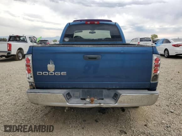 2002 Dodge 1500 with VIN 3D7HA18N12G209192, listed as a Copart auction lot 70738825 with Not provided miles and Salvage title. Bid and sale history available at DreamBid. Image 6.