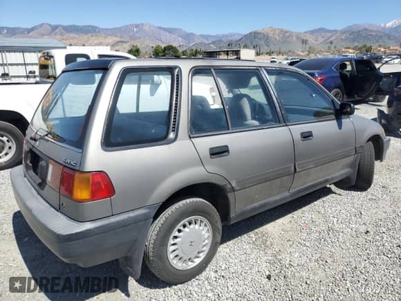 1990 Honda Civic with VIN JHMEE2752LS001520, listed as a Copart auction lot 50095545 with 456,252 mi miles and Salvage title. Bid and sale history available at DreamBid. Image 3.