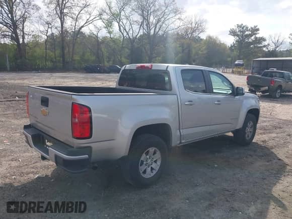 2019 Chevrolet Colorado 2WD Work Truck with VIN 1GCGSBEN3K1164686, listed as a IAAI auction lot 41943796 with 65,000 mi miles and . Bid and sale history available at DreamBid. Image 4.