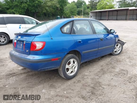 2005 Hyundai Elantra GLS z VIN KMHDN56D45U162574, wystawiony jako IAAI lot #42423833 z przebiegiem Nie podano mil oraz . Historia ofert i sprzedaży dostępna na DreamBid. Obrazek 4.