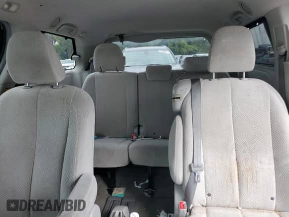 2013 Toyota Sienna LE AAS с VIN 5TDKK3DC1DS389260, выставлен на аукционе Copart как лот 84807565 с пробегом 238 792 миль миль и Списание • Salvage title. История ставок и продаж доступна на DreamBid. Изображение 10.