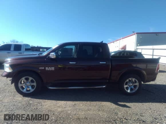 2015 Ram 1500 Laramie z VIN 1C6RR6NT5FS755037, wystawiony jako IAAI lot #41186422 z przebiegiem 128 774 mil mil oraz . Historia ofert i sprzedaży dostępna na DreamBid. Obrazek 15.
