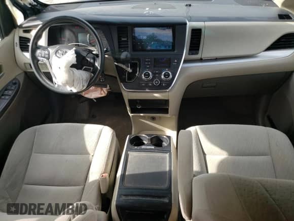 2015 Toyota Sienna LE z VIN 5TDJK3DC5FS117535, wystawiony jako Copart lot #81283925 z przebiegiem 135 333 mil mil oraz Czysty tytuł • Clean title. Historia ofert i sprzedaży dostępna na DreamBid. Obrazek 8.