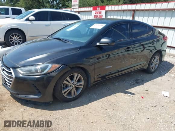 2017 Hyundai Elantra SE z VIN 5NPD84LF7HH119843, wystawiony jako IAAI lot #43153958 z przebiegiem 161 240 mil mil oraz . Historia ofert i sprzedaży dostępna na DreamBid. Obrazek 2.