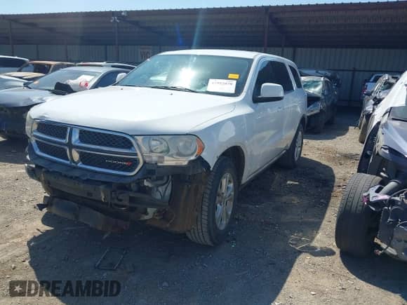 2013 Dodge Durango SXT with VIN 1C4RDHAG1DC678220, listed as a IAAI auction lot 41992038 with 166,725 mi miles and . Bid and sale history available at DreamBid. Image 2.