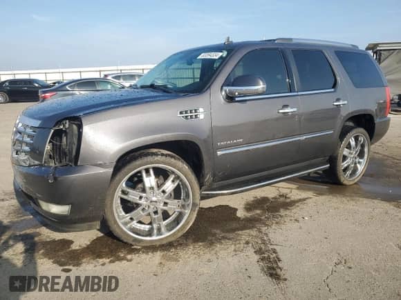 2011 Cadillac Escalade with VIN 1GYS3AEF4BR161964, listed as a Copart auction lot 83394334 with 147,525 mi miles and Salvage title. Bid and sale history available at DreamBid. Image 1.