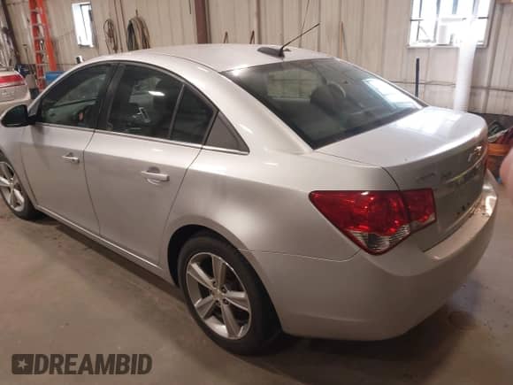 2015 Chevrolet Cruze LT with VIN 1G1PE5SB9F7159247, listed as a IAAI auction lot 42701023 with 118,698 mi miles and . Bid and sale history available at DreamBid. Image 3.