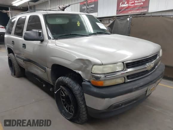 2005 Chevrolet Tahoe Z71 z VIN 1GNEC13T35R202642, wystawiony jako IAAI lot #42269486 z przebiegiem 307 025 mil mil oraz . Historia ofert i sprzedaży dostępna na DreamBid. Obrazek 1.