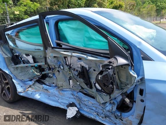 2022 Hyundai Veloster z VIN KMHT36AH7NU014310, wystawiony jako IAAI lot #42137448 z przebiegiem 38 966 mil mil oraz . Historia ofert i sprzedaży dostępna na DreamBid. Obrazek 13.