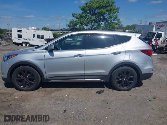 2018 Hyundai Santa Fe Ultimate с VIN 5XYZWDLA1JG534489, выставлен на аукционе IAAI как лот 42289672 с пробегом 93 198 миль миль и . История ставок и продаж доступна на DreamBid. Изображение 14.