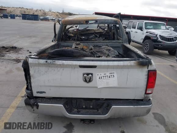 2020 Ram 1500 Tradesman z VIN 3C6RR6KT3LG290023, wystawiony jako IAAI lot #41777473 z przebiegiem Nie podano mil oraz . Historia ofert i sprzedaży dostępna na DreamBid. Obrazek 15.