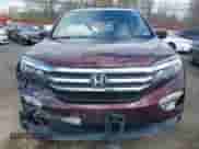 2017 Honda Pilot EX-L with VIN 5FNYF6H74HB040889, listed as a IAAI auction lot 42040094 with 84,001 mi miles and . Bid and sale history available at DreamBid. Image 12.