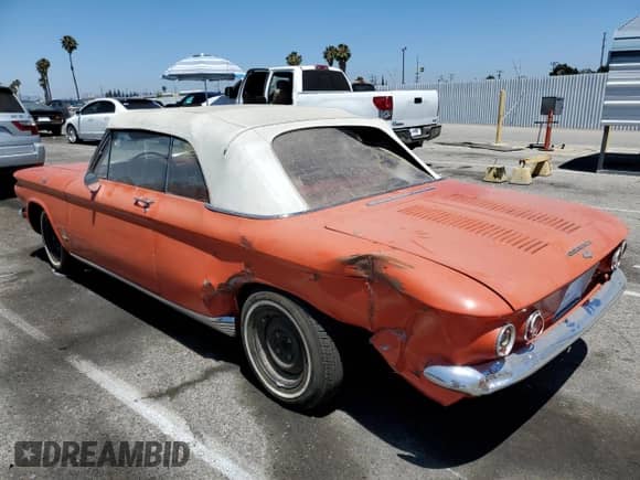 1962 Chevrolet Corvair with VIN 20967W302551, listed as a Copart auction lot 63259515 with 185,097 mi miles and Salvage title. Bid and sale history available at DreamBid. Image 2.