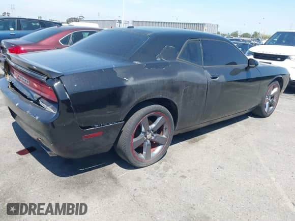 2013 Dodge Challenger SXT with VIN 2C3CDYAG9DH708717, listed as a IAAI auction lot 41990705 with 92,784 mi miles and . Bid and sale history available at DreamBid. Image 4.