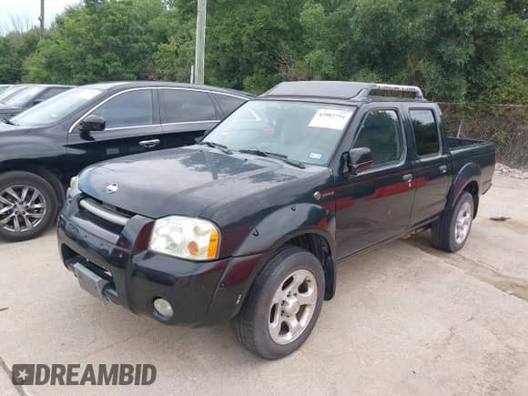 2001 Nissan Frontier with VIN 1N6MD27T21C374611, listed as a IAAI auction lot 42982754 with 168,797 mi miles and . Bid and sale history available at DreamBid. Image 2.