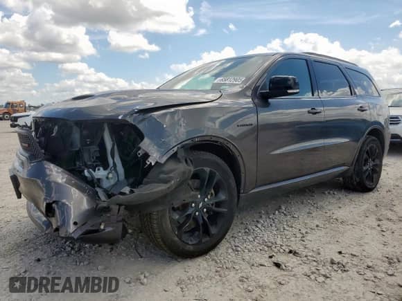 2020 Dodge Durango R/T with VIN 1C4SDHCT2LC329707, listed as a Copart auction lot 65812905 with 67,035 mi miles and Salvage title. Bid and sale history available at DreamBid. Image 1.