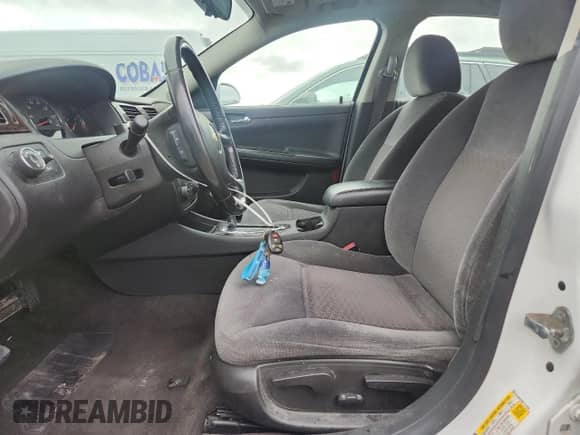 2014 Chevrolet Impala LT z VIN 2G1WB5E30E1137450, wystawiony jako Copart lot #84210725 z przebiegiem 223 428 mil mil oraz Szkoda całkowita • Salvage title. Historia ofert i sprzedaży dostępna na DreamBid. Obrazek 7.