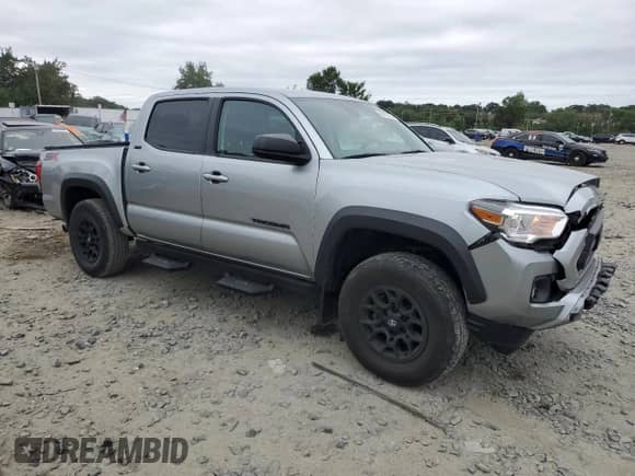 2023 Toyota Tacoma TRD Off Road with VIN 3TMCZ5AN4PM578376, listed as a Copart auction lot 69767095 with 41,782 mi miles and Salvage title. Bid and sale history available at DreamBid. Image 4.