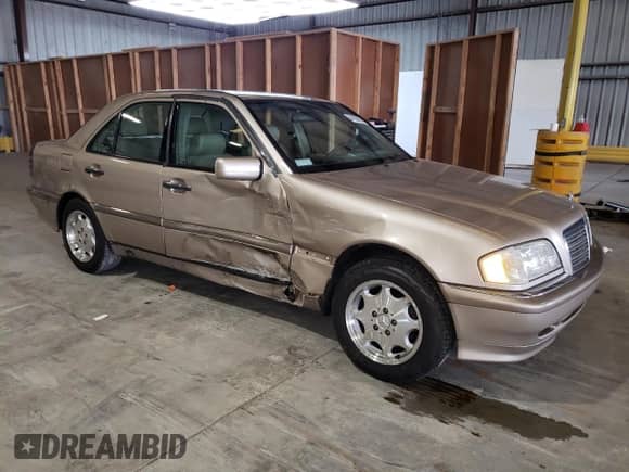 2000 Mercedes-Benz C 230/260/280/320 z VIN WDBHA29G9YA806709, wystawiony jako Copart lot #64520855 z przebiegiem 78 480 mil mil oraz Czysty tytuł • Clean title. Historia ofert i sprzedaży dostępna na DreamBid. Obrazek 4.