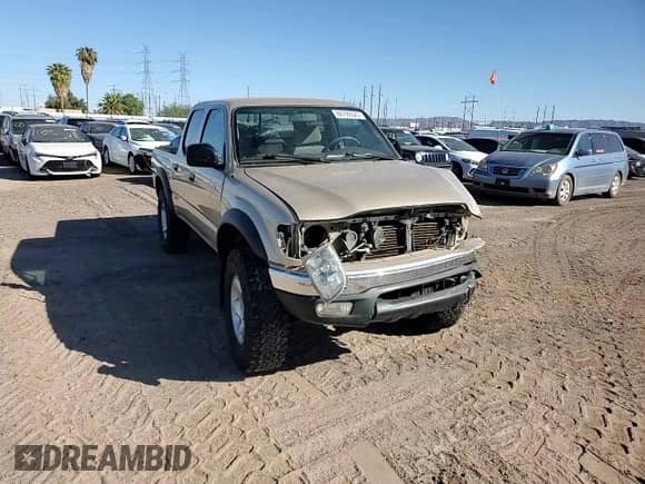 2001 Toyota Tacoma PreRunner z VIN 5TEGN92N71Z859665, wystawiony jako Copart lot #84799325 z przebiegiem 202 008 mil mil oraz Szkoda całkowita • Salvage title. Historia ofert i sprzedaży dostępna na DreamBid. Obrazek 13.