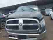 2021 Ram 1500 Tradesman z VIN 1C6RR6FG4MS524838, wystawiony jako IAAI lot #42642472 z przebiegiem 110 098 mil mil oraz . Historia ofert i sprzedaży dostępna na DreamBid. Obrazek 13.