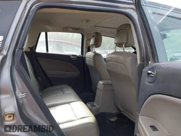 2011 Dodge Caliber Uptown with VIN 1B3CB9HB9BD254451, listed as a IAAI auction lot 42247772 with 188,757 mi miles and . Bid and sale history available at DreamBid. Image 8.