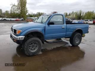 1996 Toyota Tacoma z VIN 4TAPM62N6TZ160037, wystawiony jako Copart lot #52085095 z przebiegiem 299 646 mil mil oraz Szkoda całkowita • Salvage title. Historia ofert i sprzedaży dostępna na DreamBid. Obrazek 1.