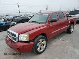 2007 Dodge Dakota SLT с VIN 1D7HE48K97S215043, выставлен на аукционе Copart как лот 59347535 с пробегом 211 768 миль миль и Списание • Salvage title. История ставок и продаж доступна на DreamBid. Изображение 1.