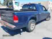 2004 Dodge Dakota Sport z VIN 1D7HL38NX4S524655, wystawiony jako IAAI lot #42769806 z przebiegiem 173 264 mil mil oraz . Historia ofert i sprzedaży dostępna na DreamBid. Obrazek 4.