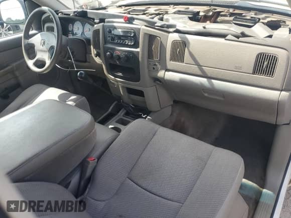 2002 Dodge 1500 z VIN 1D7HA16K52J177399, wystawiony jako Copart lot #55278015 z przebiegiem 194 835 mil mil oraz Czysty tytuł • Clean title. Historia ofert i sprzedaży dostępna na DreamBid. Obrazek 8.