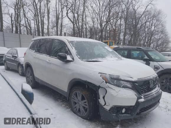 2019 Honda Passport EX-L with VIN 5FNYF8H53KB029769, listed as a IAAI auction lot 41311354 with 41,070 mi miles and . Bid and sale history available at DreamBid. Image 1.