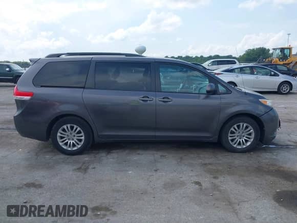 2012 Toyota Sienna XLE AAS with VIN 5TDYK3DC9CS242547, listed as a IAAI auction lot 42981571 with 156,662 mi miles and . Bid and sale history available at DreamBid. Image 13.