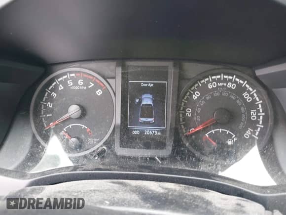 2023 Toyota Tacoma SR with VIN 3TYSX5EN6PT021792, listed as a IAAI auction lot 43037546 with 20,673 mi miles and . Bid and sale history available at DreamBid. Image 7.