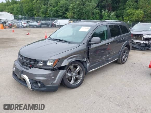 2015 Dodge Journey Crossroad with VIN 3C4PDDGG0FT619089, listed as a IAAI auction lot 43050045 with 167,984 mi miles and . Bid and sale history available at DreamBid. Image 2.