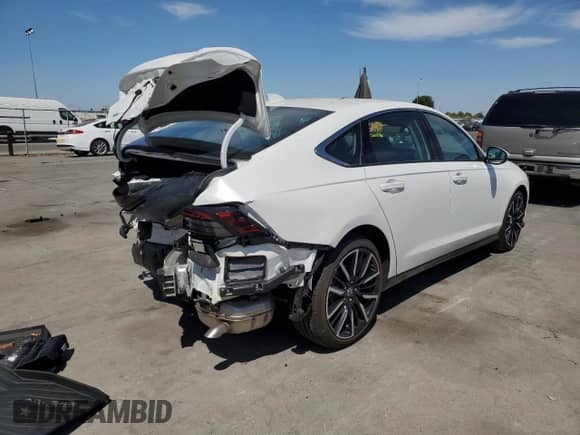 2025 Honda Accord Touring with VIN 1HGCY2F86SA054903, listed as a Copart auction lot 69969195 with 1,506 mi miles and Salvage title. Bid and sale history available at DreamBid. Image 3.